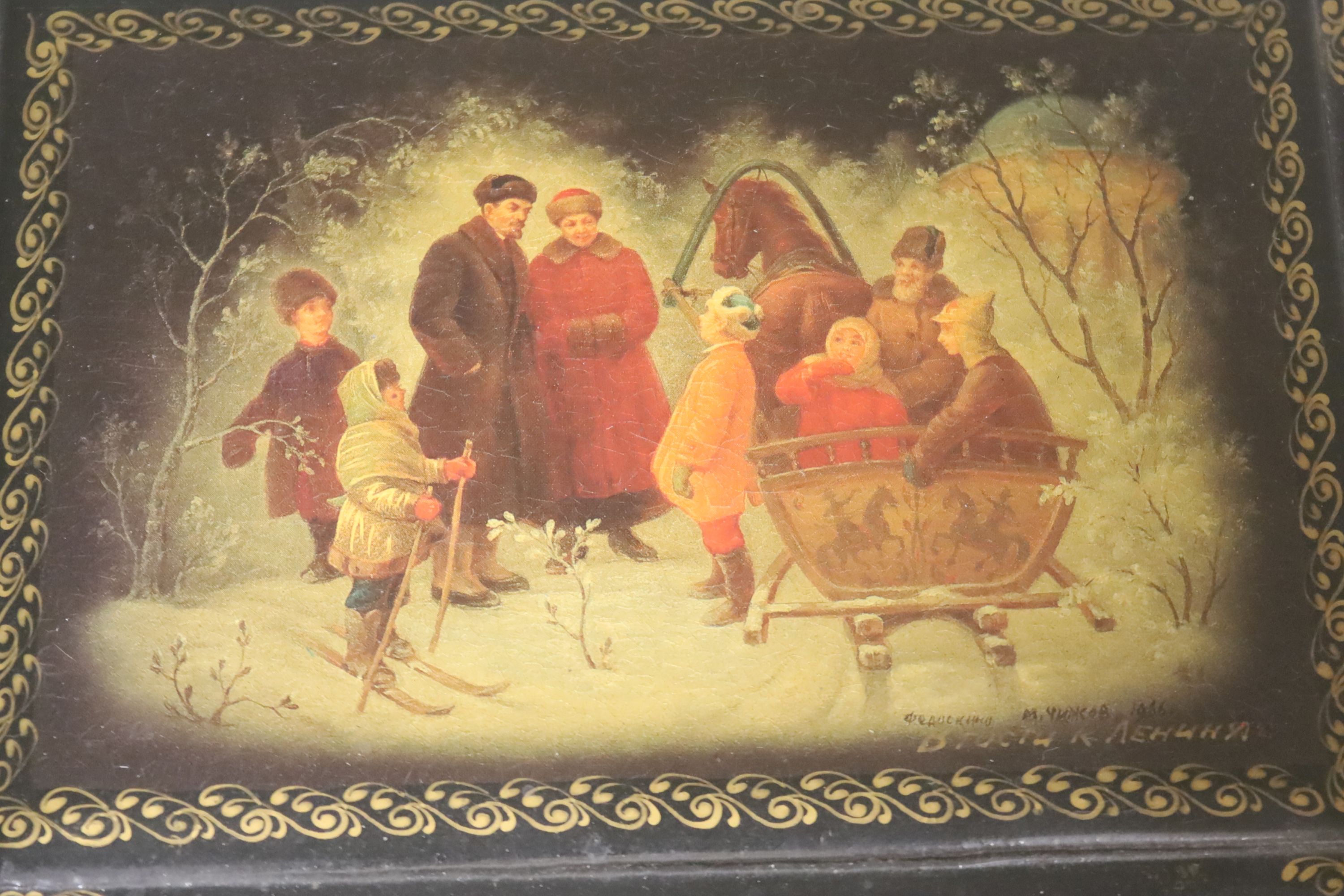 A collection of seven Russian painted lacquer boxes, largest raised on bracket base 15 x 20cm 9.5cm high